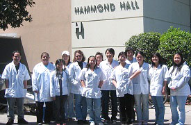 pharmacy students in front of Hammond Hall