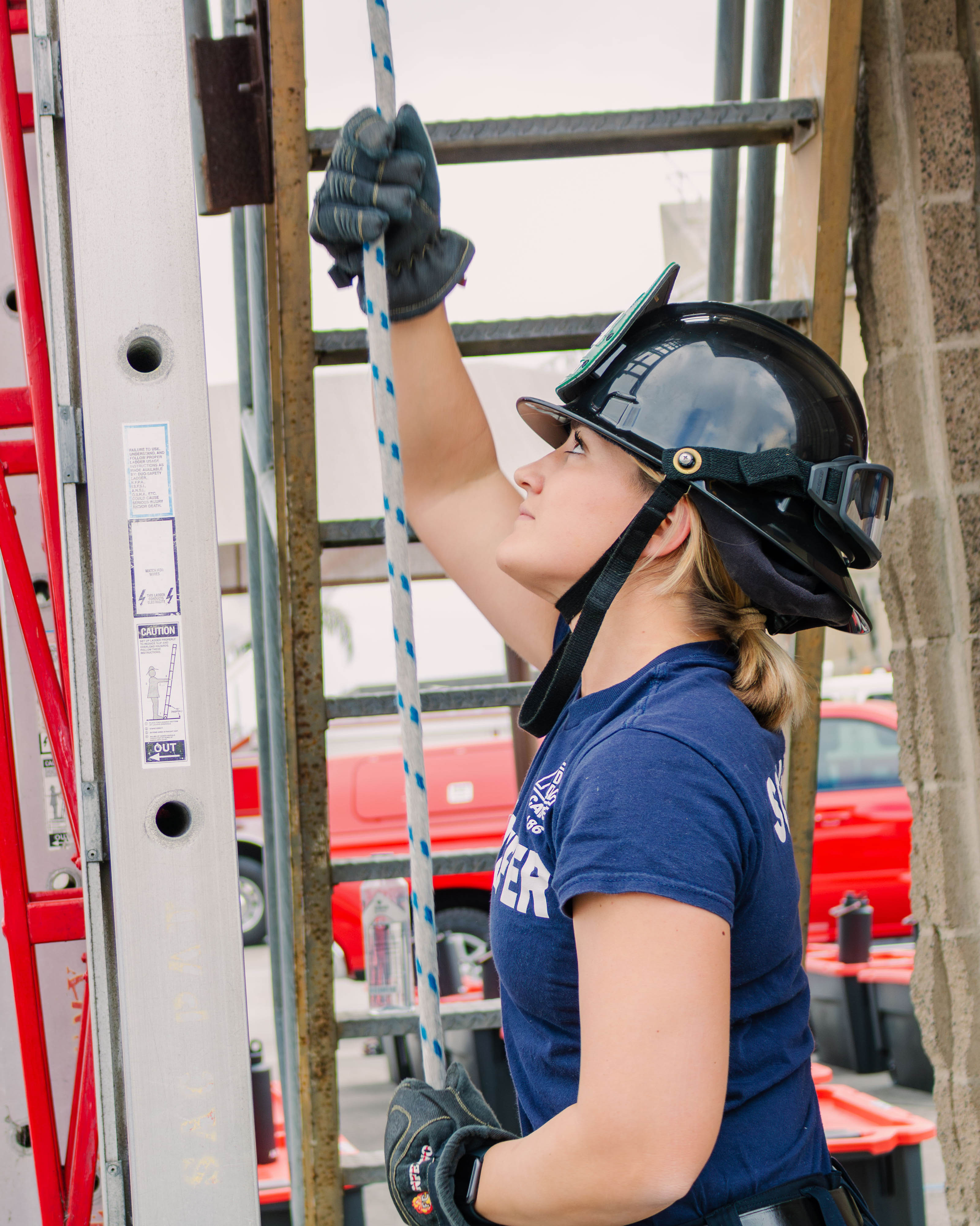 Lauren Schaefer pulling down a rope