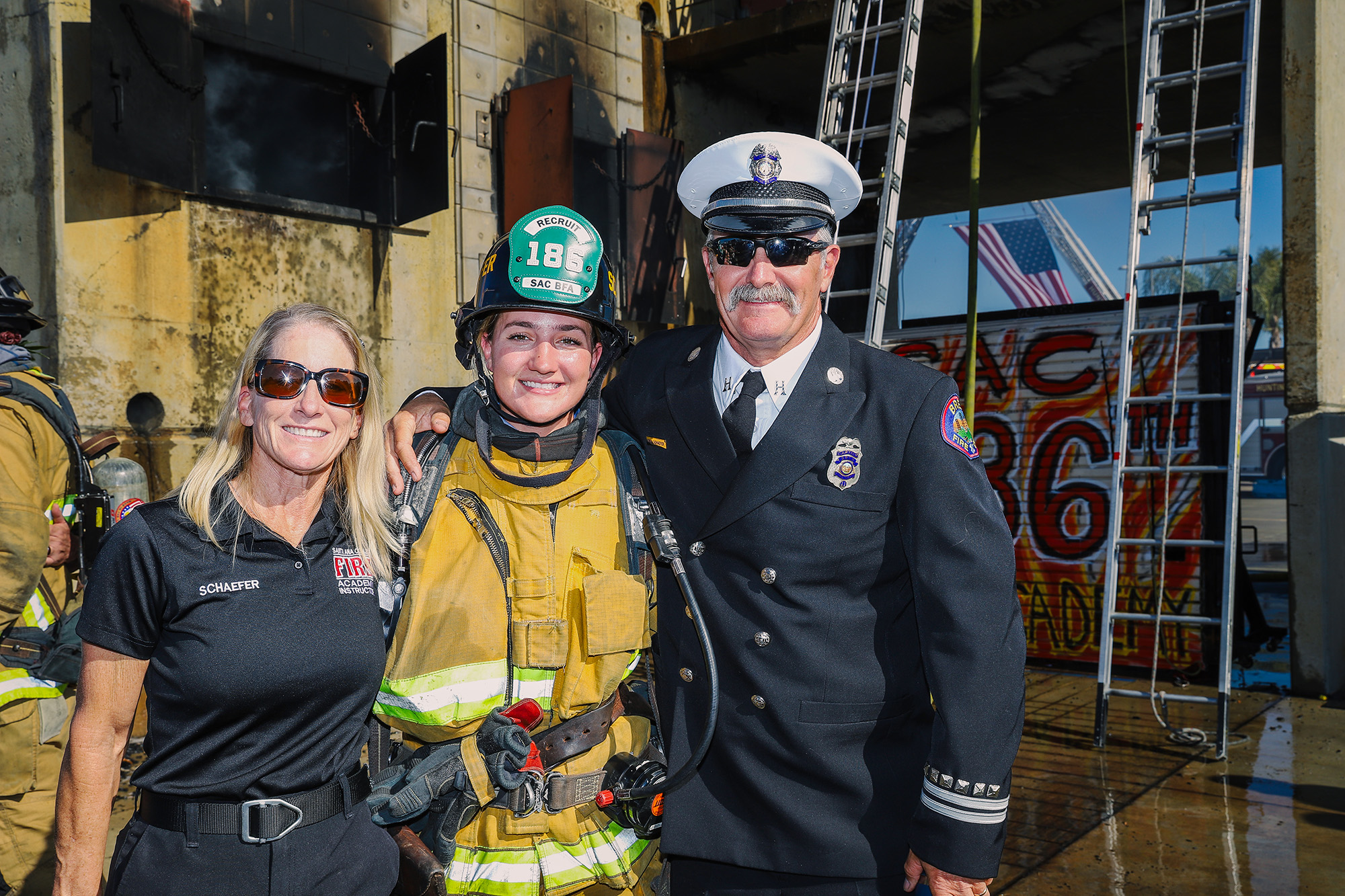 Lauren Schaefer (center) with her mother and father