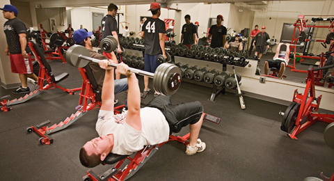 The SAC baseball team works out in the weight room before practice