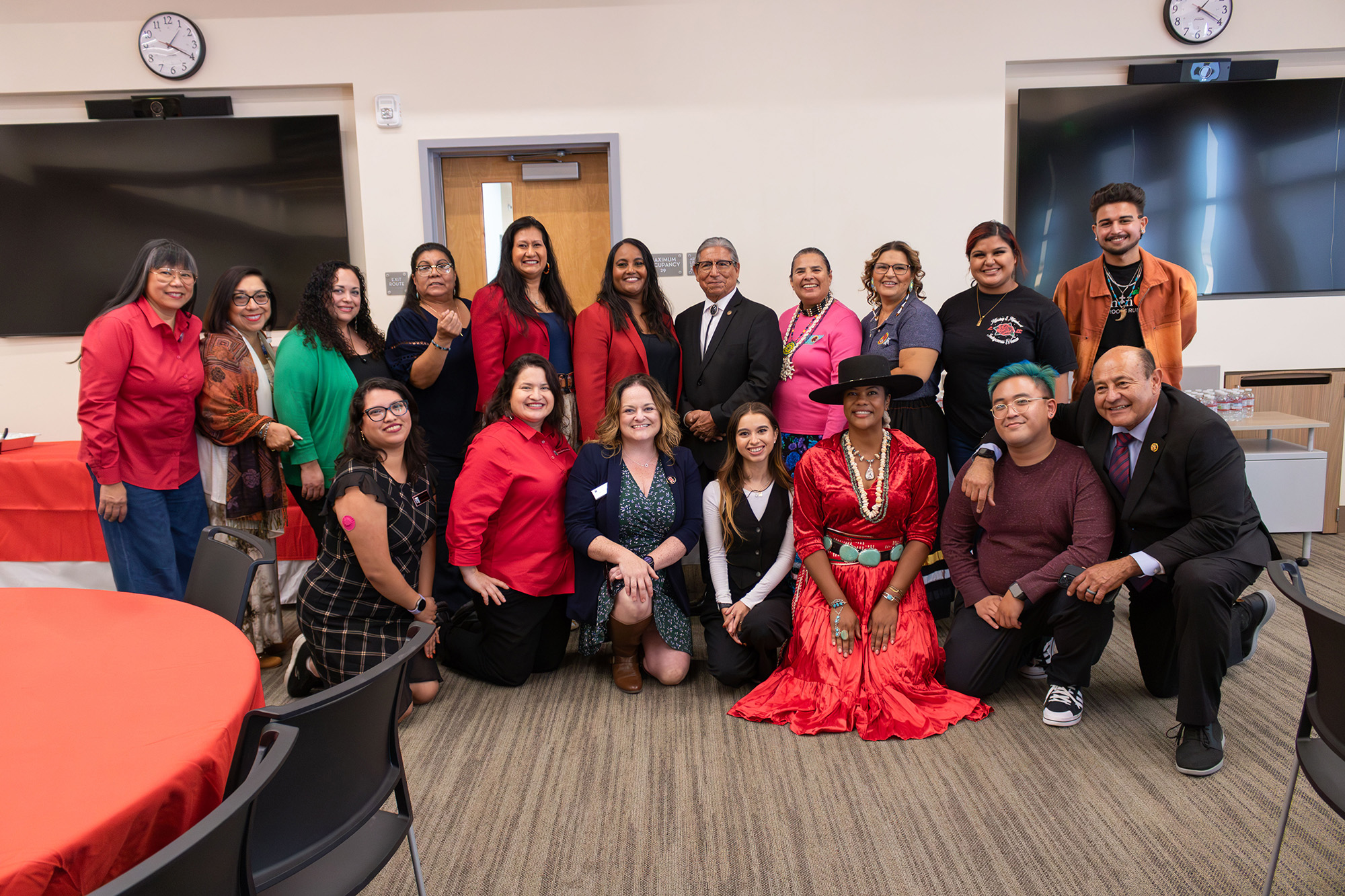 Tukwot (pictured second row far right) in a group at Native american history month event