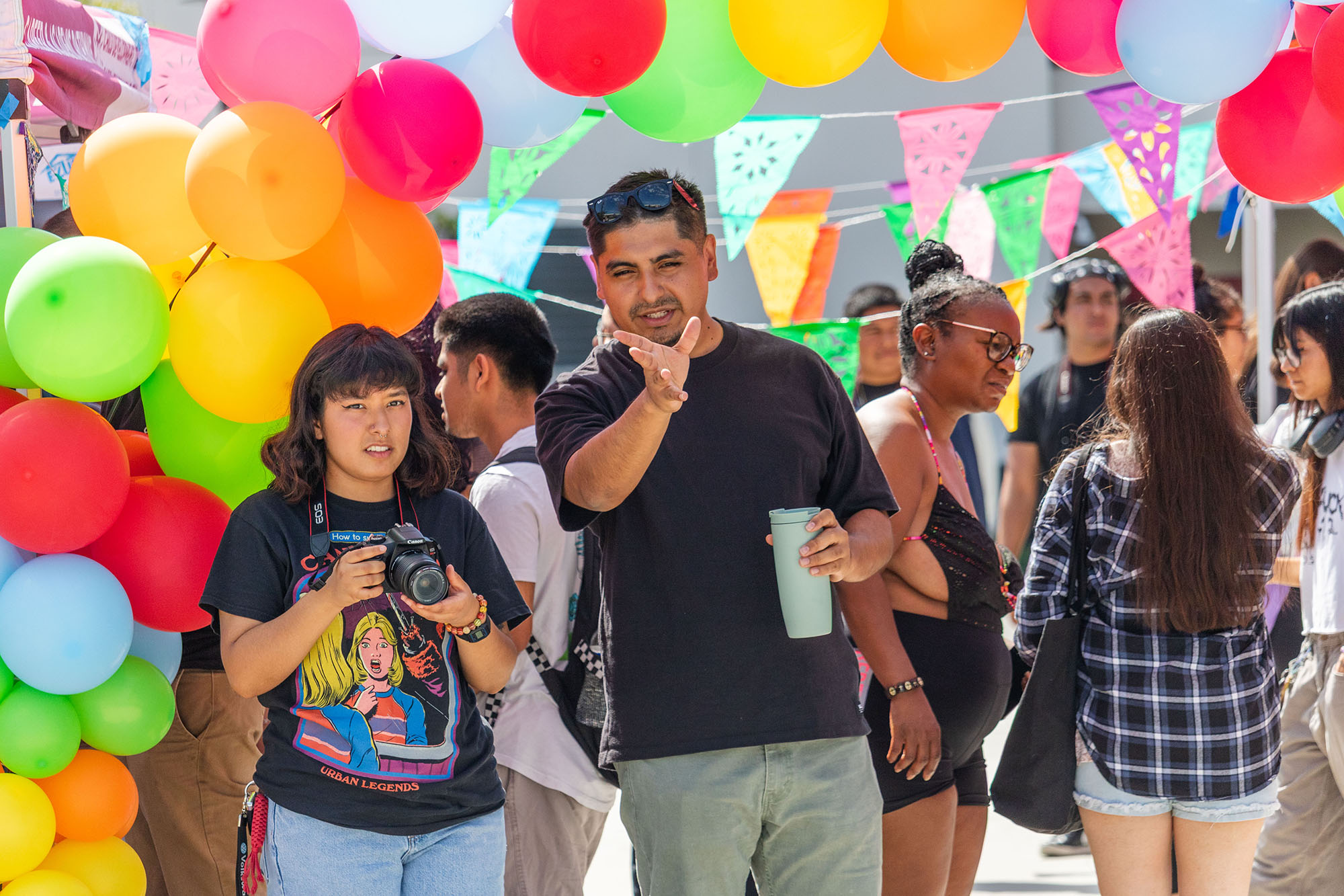 Female Photography student receiving guidance from instructor