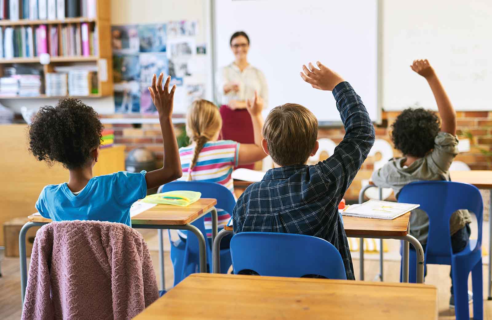 child exploring a classroom