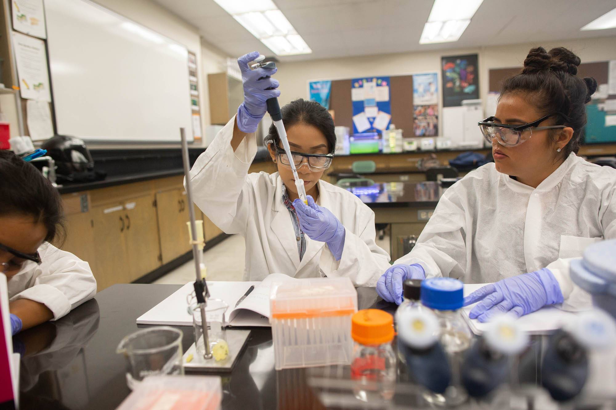 students taking samples for experiments