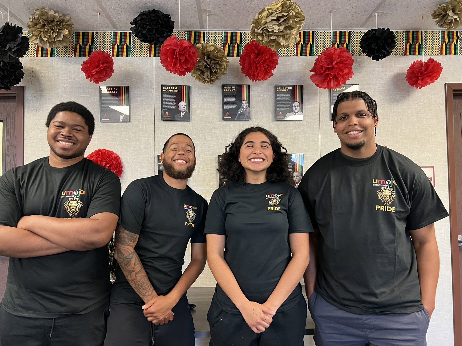 U2 scholars students standing inside