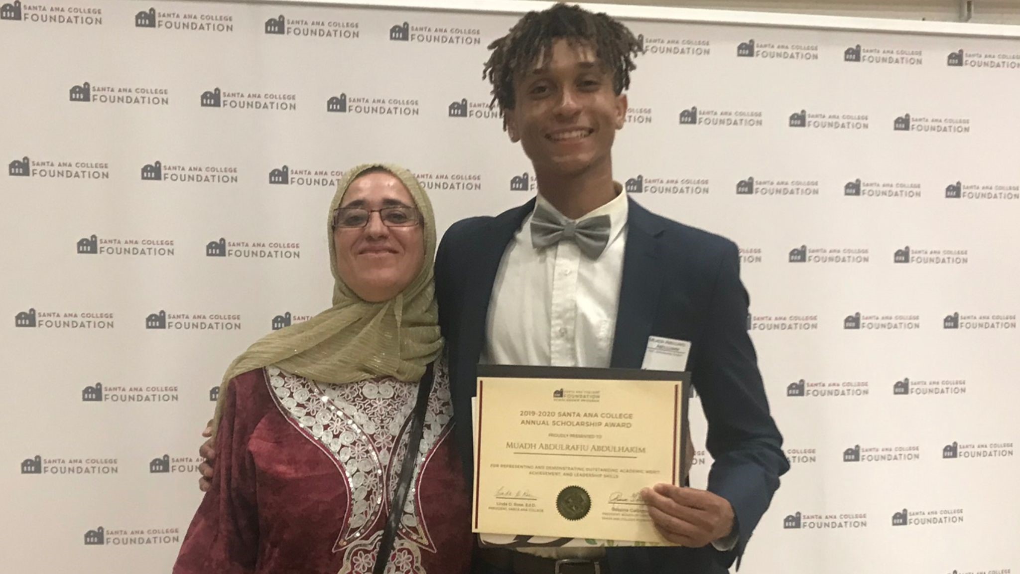 Scholarship Recipient Muadh Abdul Hakim and his mother