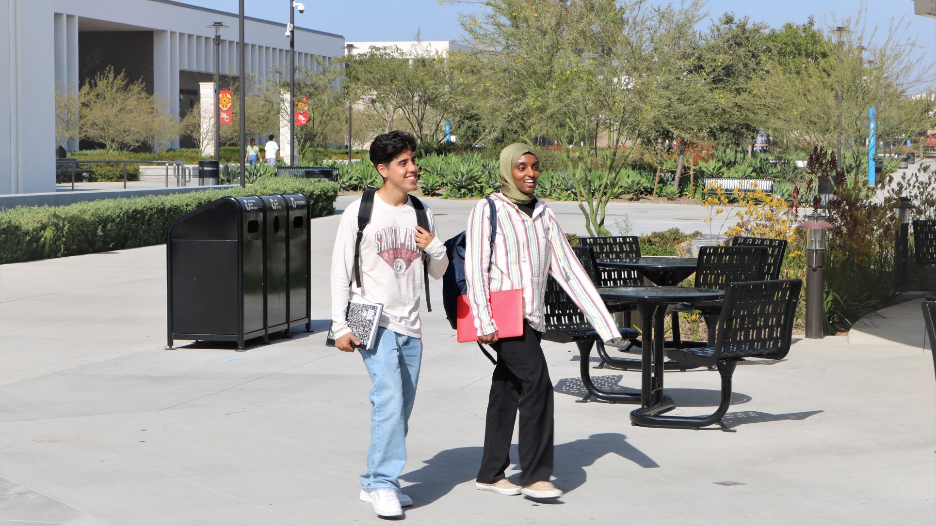 Two students walk on SAC Campus