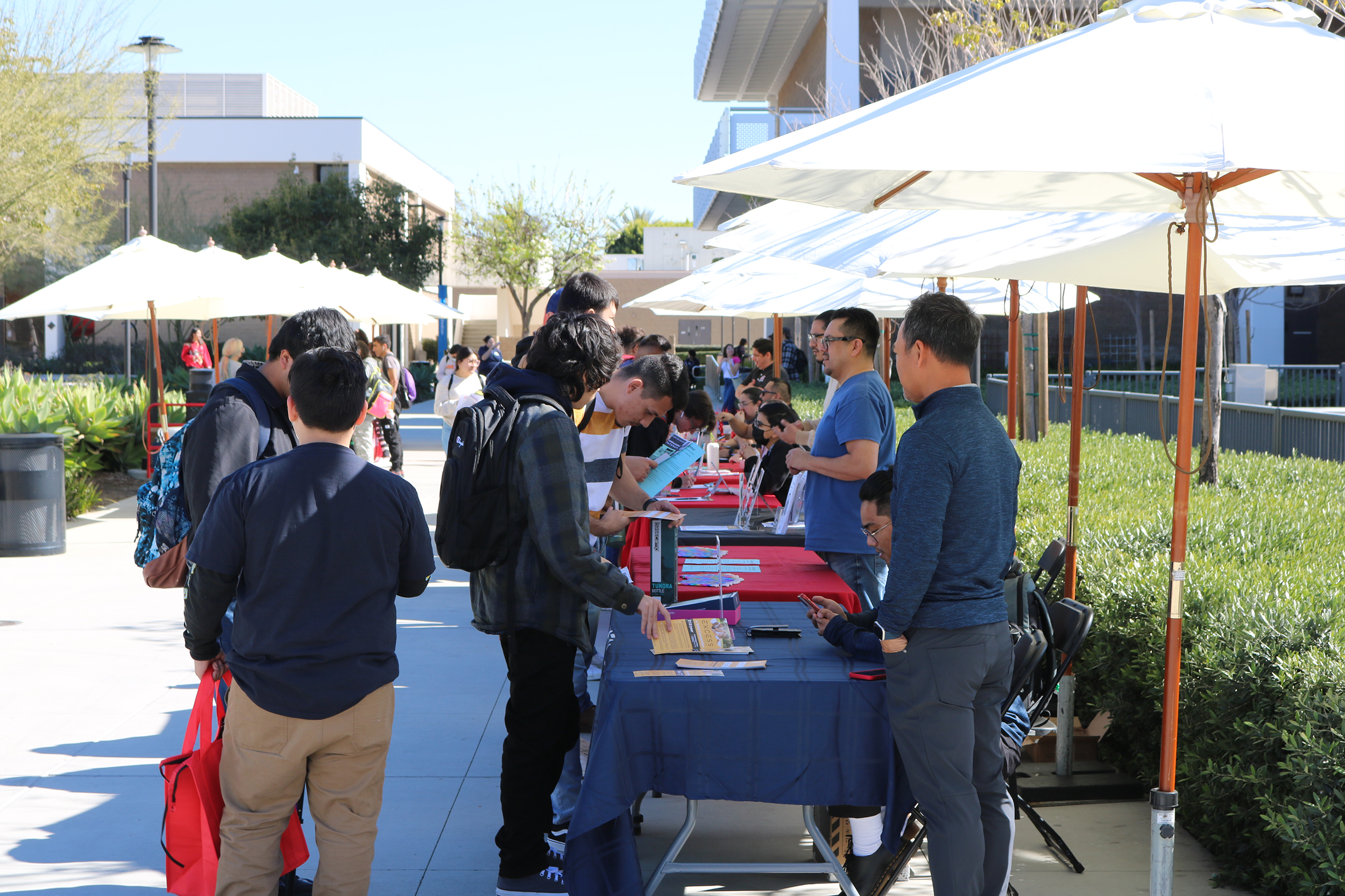 sac students registering at Excess Telecom booth
