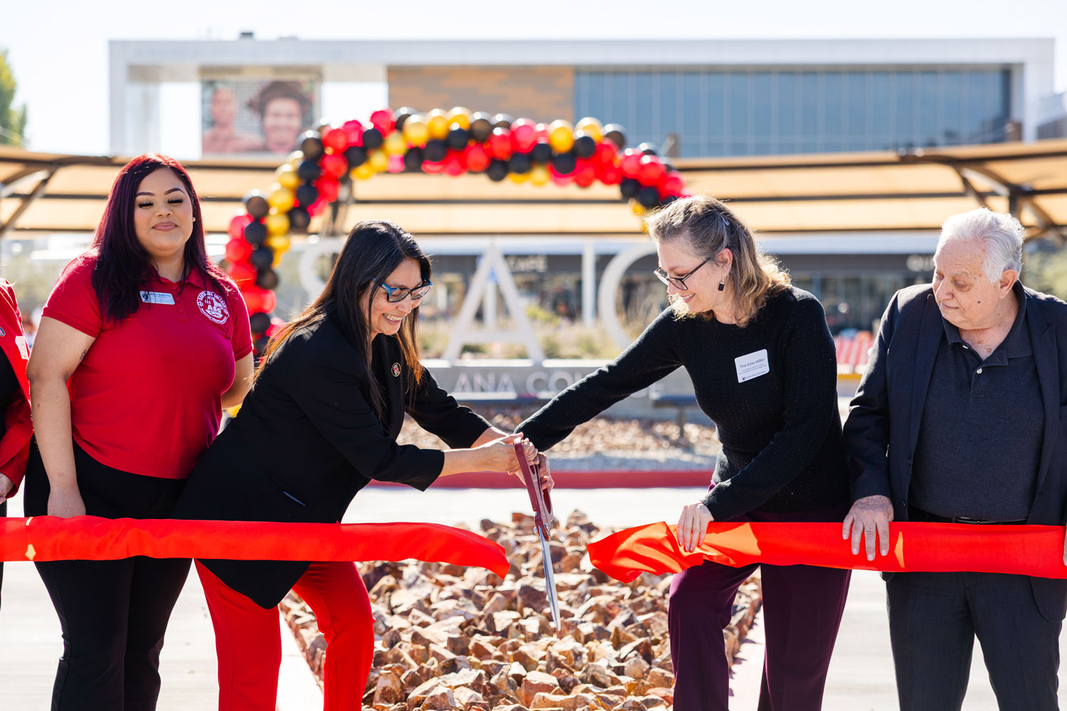 Dr. Annebelle Nery and Tina Arias Miller cutting the ribbon