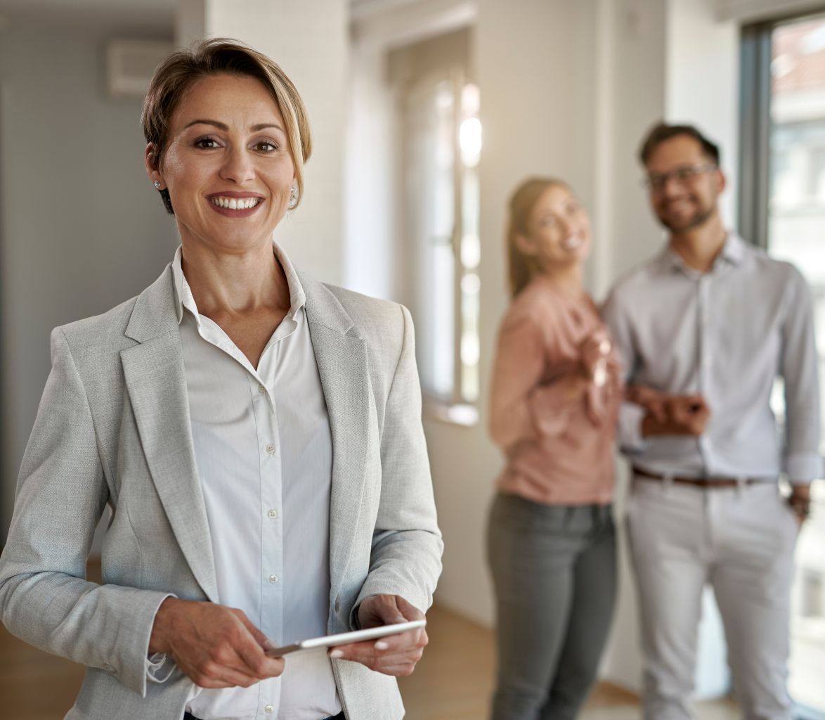 Older woman working as real estage agent, selling home using training from free career education classes at Santa Ana College.