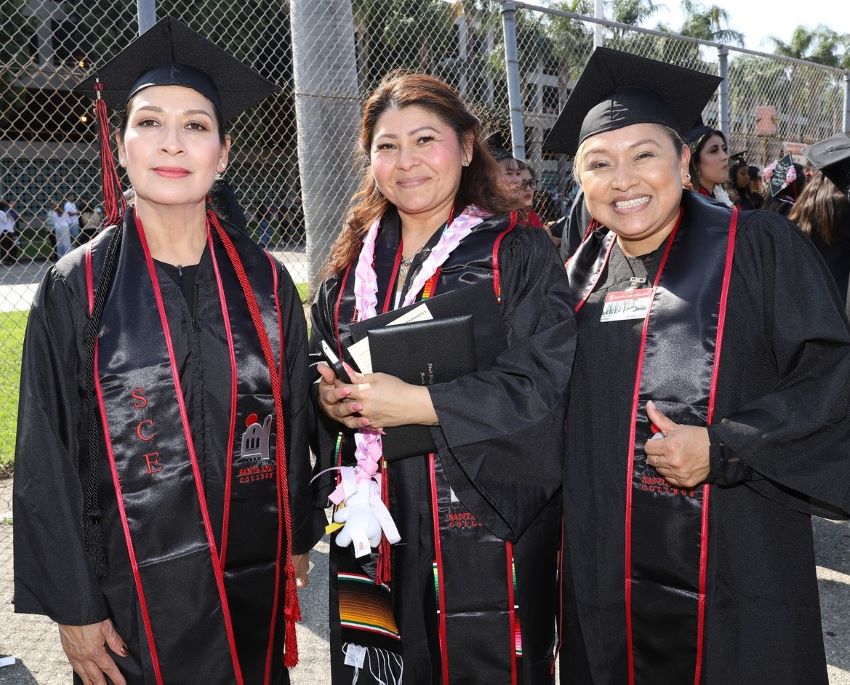 Continuing Education students graduating with their high school diplomas in Santa Ana, California, near Orange, Irvine, and Fountain Valley.
