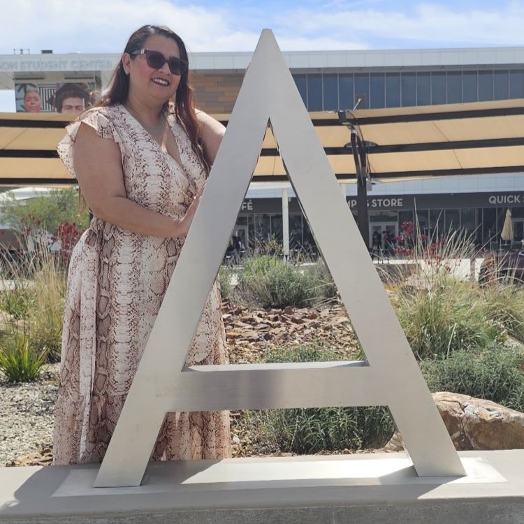 Woman achieving dream of working in nursing after finishing free GED and healthcare classes with Continuing Education, near Anaheim, Irvine, and Tustin.