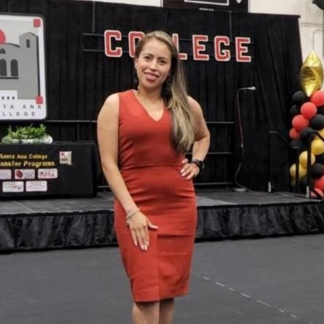 Latina woman returns to Santa Ana College after finishing BA degree after learning English from free classes with Continuing Education.
