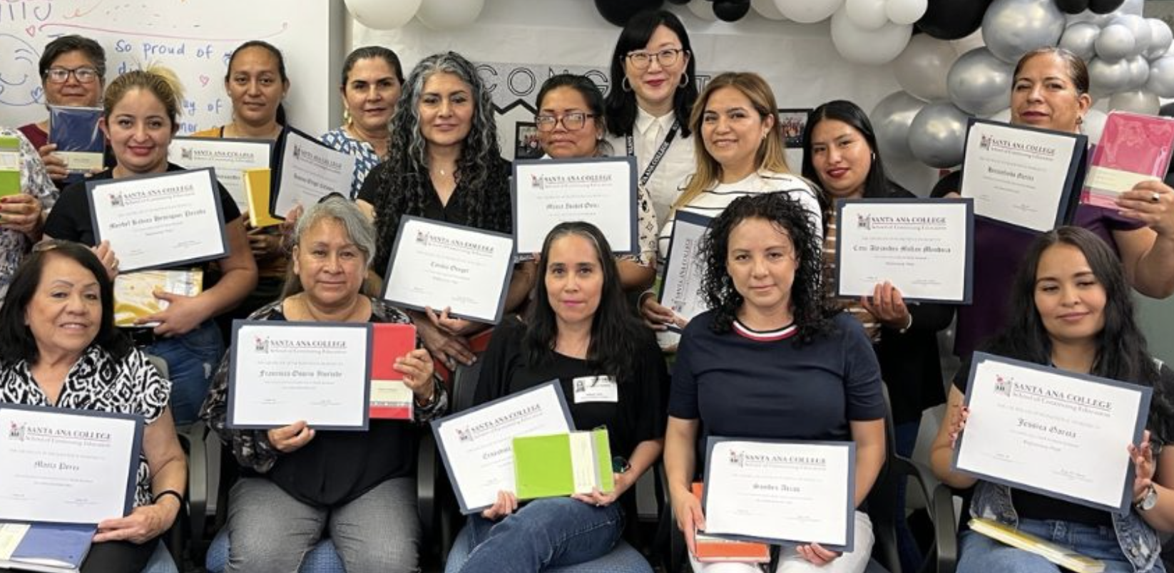 Students smiling with Certificates Student earning certificates at SAUSD