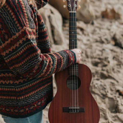 Woman holding Ukulele
